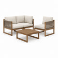 Salon de jardin 4 pièces en bois d'acacia brun avec coussins beige canapé 2 places fauteuil et table basse 120 x 60 cm